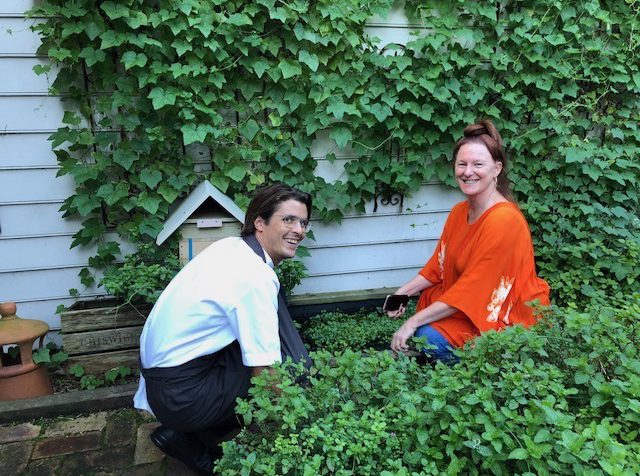 Francois Poulard in the Chiswick kitchen garden with Roberta Muir