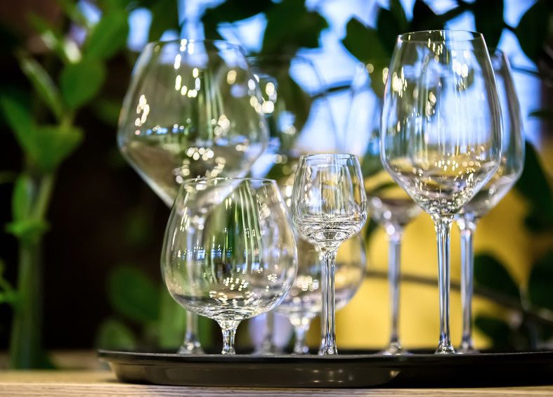 empty wineglasses on a tray